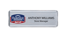 Reusable clear-lens name badge with replaceable insert